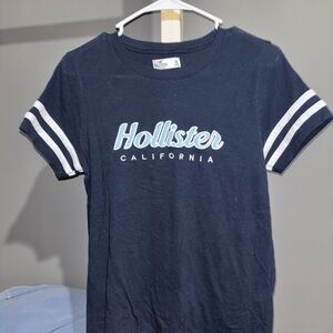 Hollister women’s Dark Blue Tee with White Stripes
